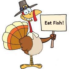 A cartoon turkey holding up a sign that reads "Eat fish!"
